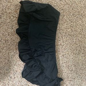 Two swim tops with one bottom